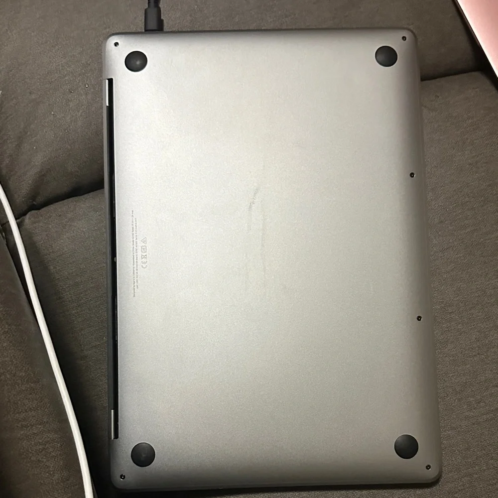 Apple MacBook with Black and Silver Design